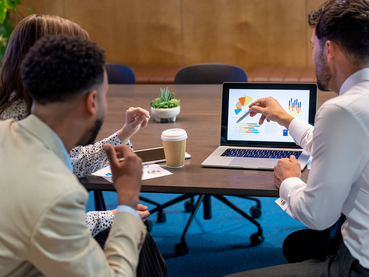 Man working with clients at table